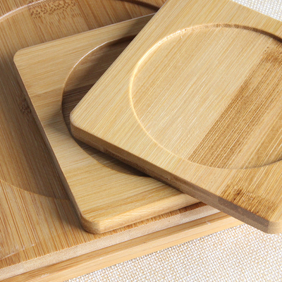 Caboteurs en bambou vides faits sur commande pour le tapis en bois en bambou de soucoupe en place de boissons